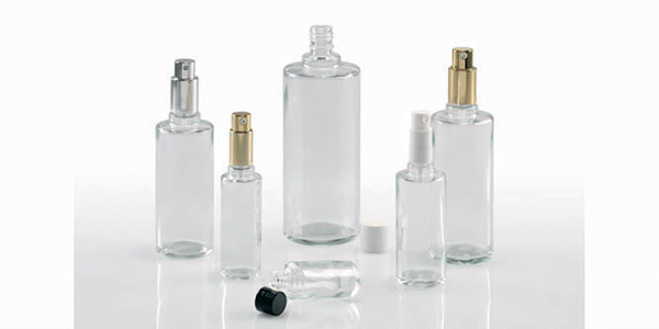 bouillotte ronde contenant en verre flacon rond verre parfumerie cosmetique